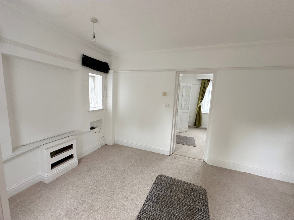 Lot: 147 - TWO-BEDROOM SEMI-DETACHED HOUSE FOR IMPROVEMENT - Dining Room with Living room access shown